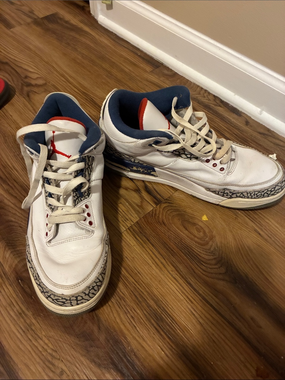 Jordan Men's White Sneakers with Blue & Red Accents